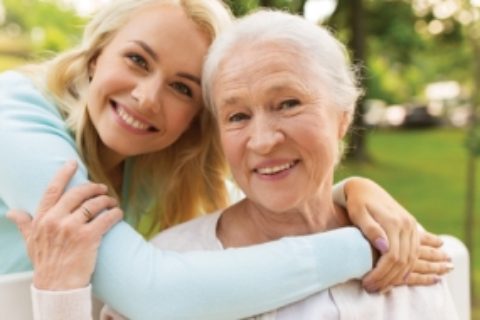 Mother and daughter together facing the camera